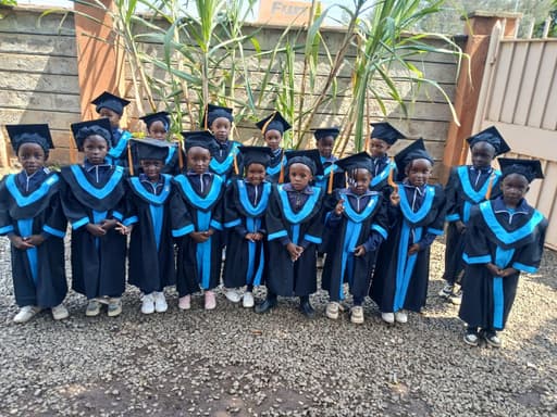 St. Scholastica learners celebrating their graduation